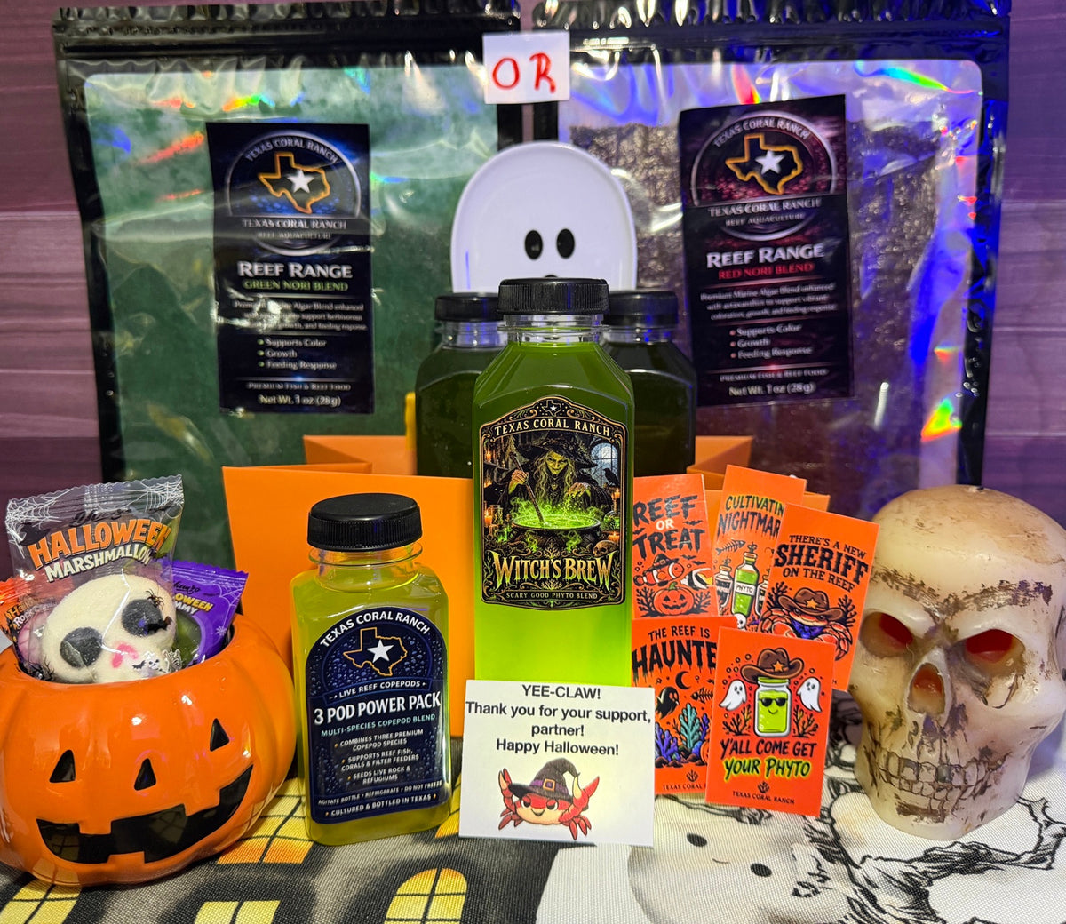 Texas Coral Ranch Week 1 Witch's Brew Halloween display with orange bag and pumpkin, three phytoplankton bottles, 3 Pod Power Pack, red or green nori choice, and Halloween extras